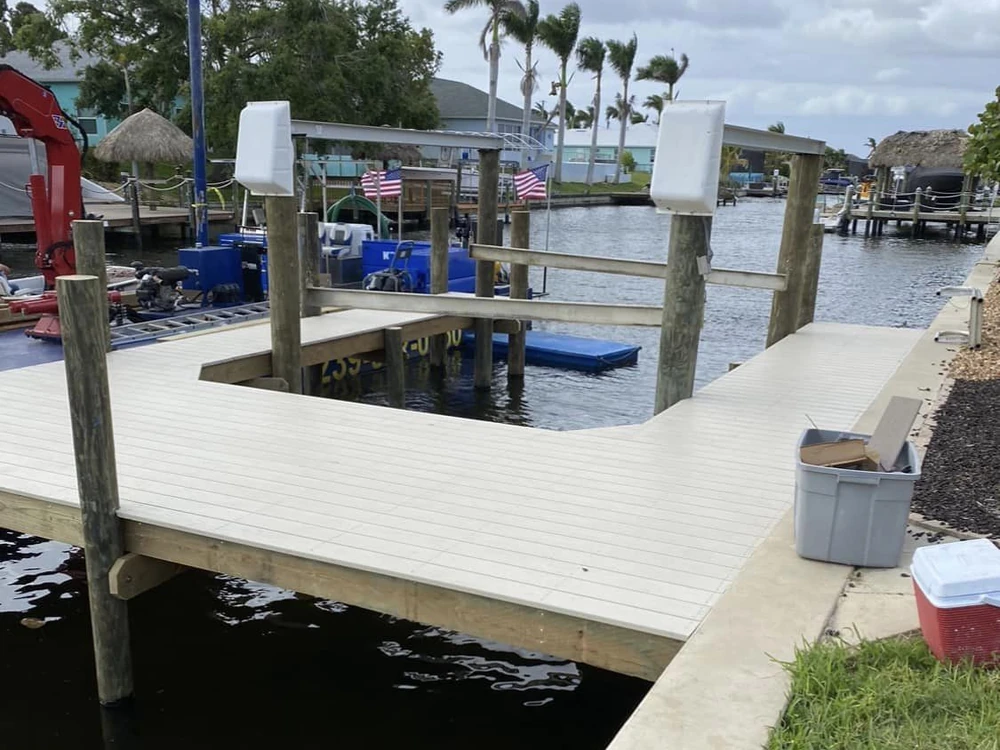 Active Cape Coral waterfront worksite prepared for a new boat lift installation