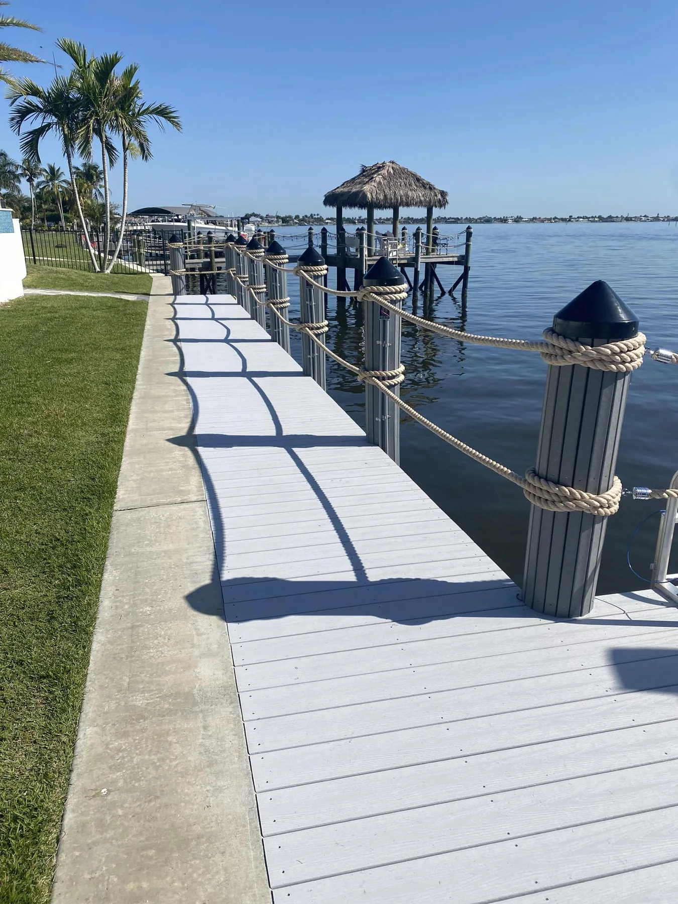 Finished waterfront dock walkway | Top Notch Docks Finished waterfront dock walkway by Top Notch Docks serving Cape Coral and Fort Myers