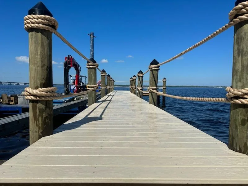 Custom rope rail dock construction | Top Notch Docks Custom rope rail dock construction by Top Notch Docks for saltwater waterfront use