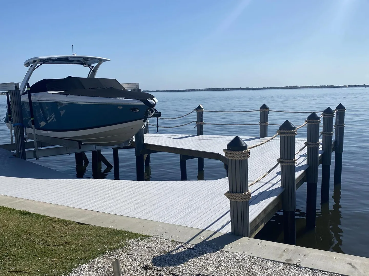 Cape Coral marine contractor dock and boat lift project | Top Notch Docks Cape Coral waterfront dock and boat lift project by Top Notch Docks