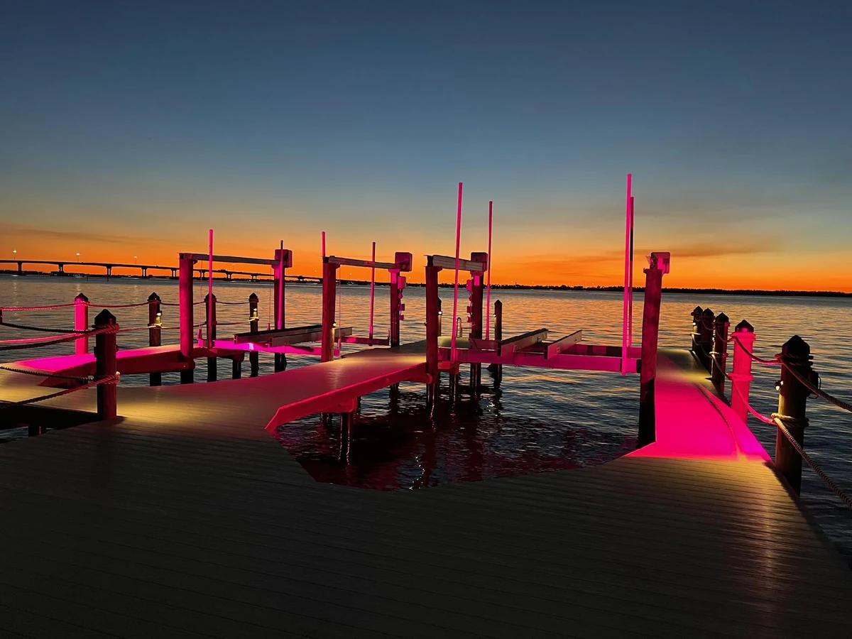 Finished saltwater waterfront dock | Top Notch Docks Finished saltwater waterfront dock at sunset showing the kind of completed waterfront environment removal can prepare for