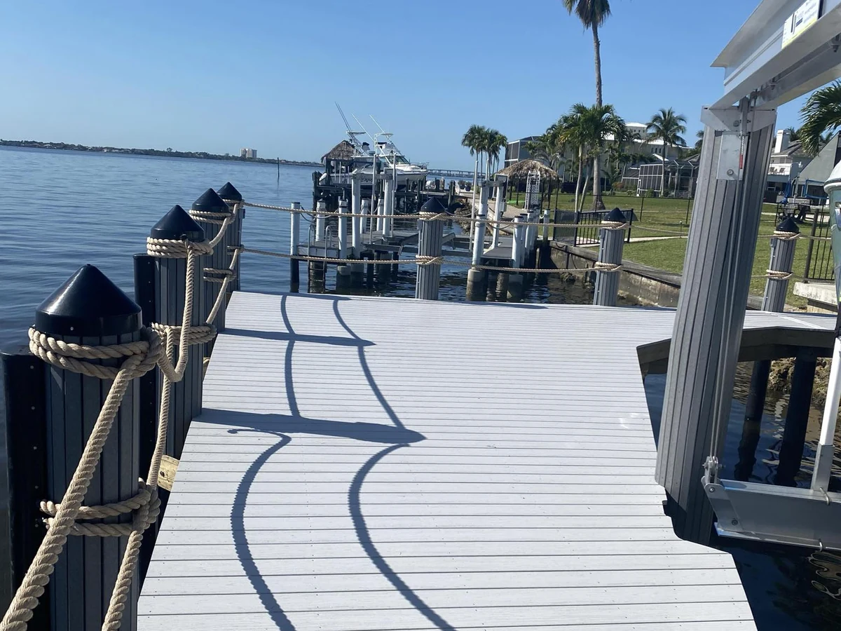 Cape Coral waterfront dock walkway | Top Notch Docks Finished Cape Coral dock walkway on a saltwater waterfront property