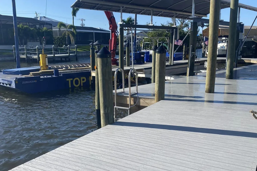 Active marine construction with work barge and crane