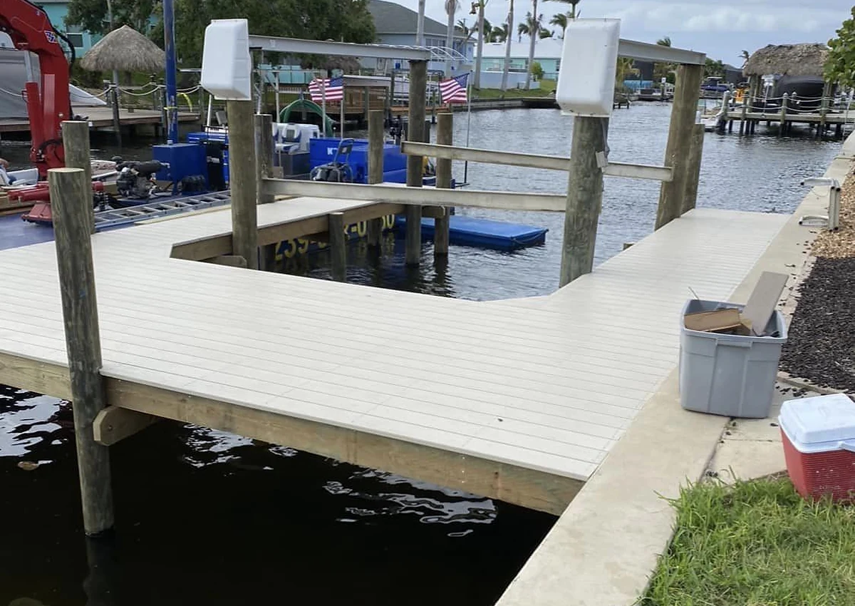 Boat lift installation integrated with the dock | Top Notch Docks project photography Boat lift installation integrated with the dock from the Top Notch Docks project library