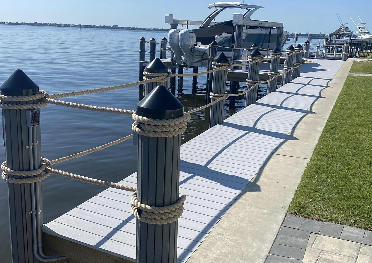 Completed dock with boat lift access | Top Notch Docks project photography Completed dock with boat lift access from the Top Notch Docks project library